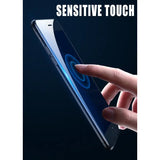 a hand holding a samsung smartphone with the text sensitive touch