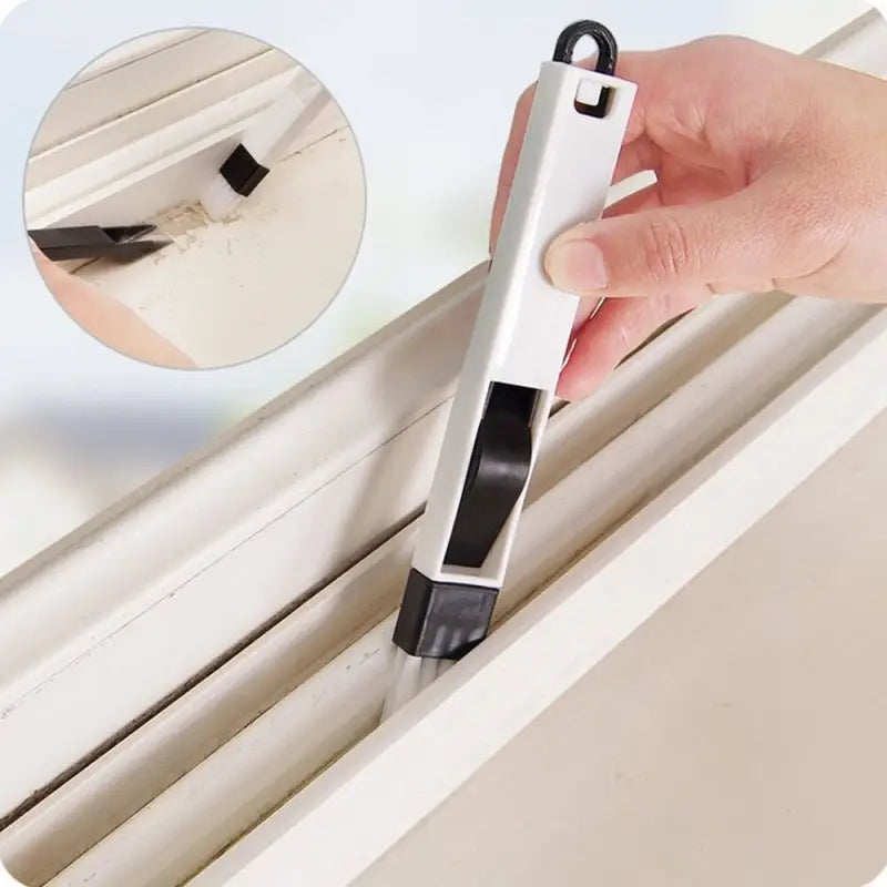 a hand holding a window sealer to open the window