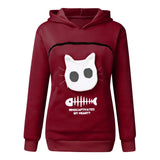 a red hoodie with a white cat on it