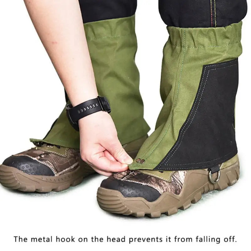 a person wearing a pair of hiking shoes