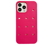 Hot pink phone case with holes.