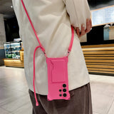 Hot pink smartphone case with a shoulder strap and card holder.