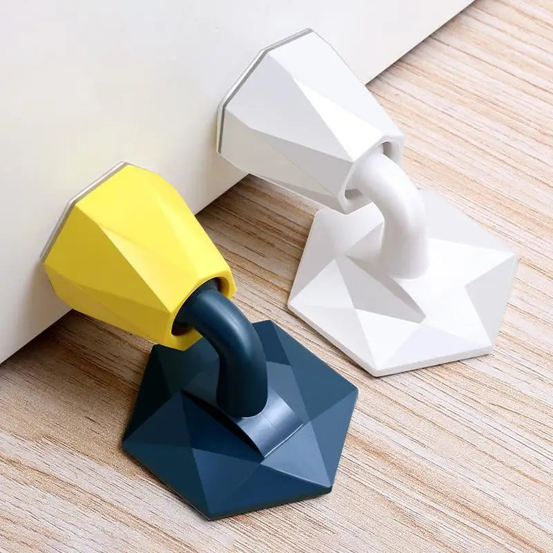 a pair of geometric shaped door knobs