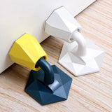 a pair of geometric shaped door knobs