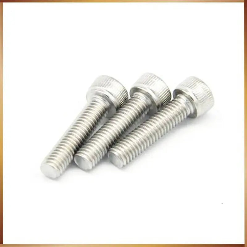a set of screws on a white background