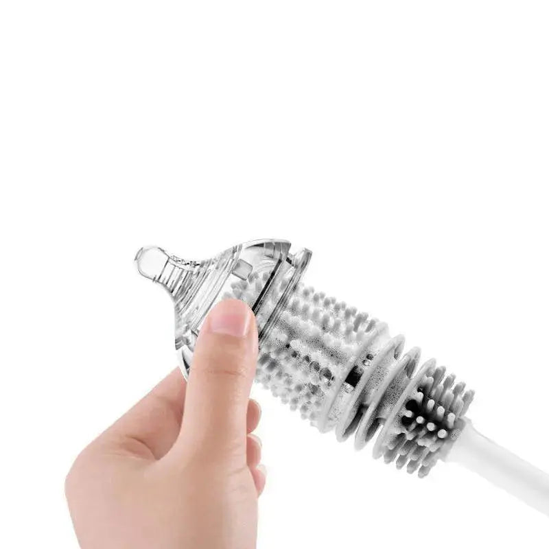 a hand holding a plastic pipe with a white background