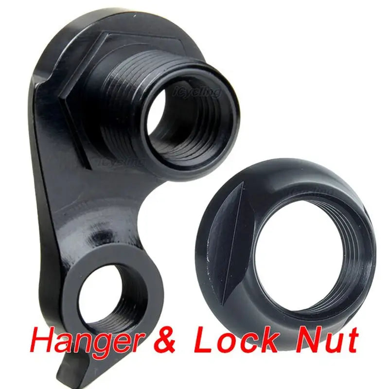a pair of black plastic fittings for a large pipe