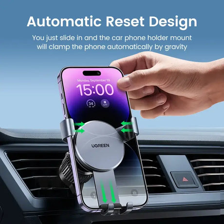 An image of a car dashboard with a phone in the center