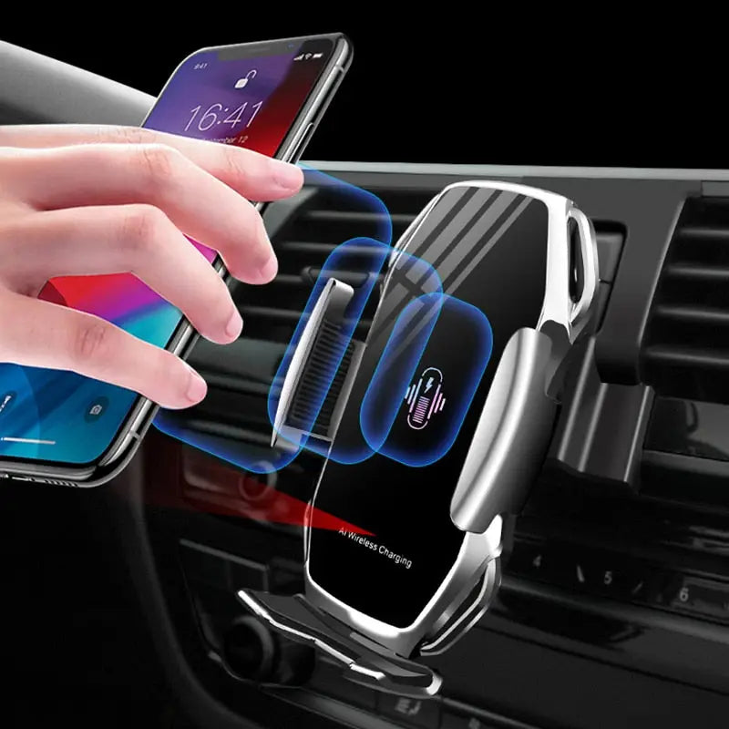 the car phone holder is shown with a hand holding the phone