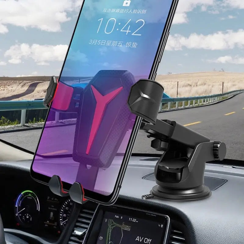 the car phone holder is attached to the dashboard