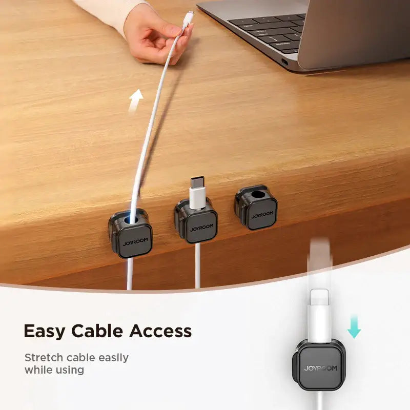 an image of a person using a cable to connect a laptop