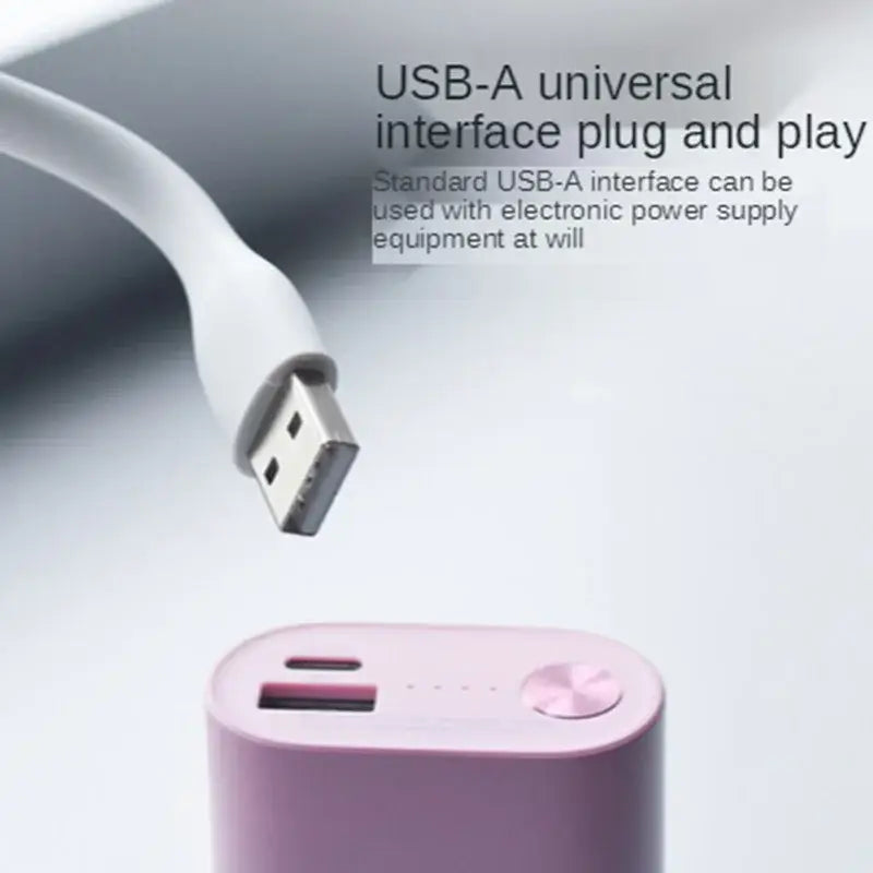 an image of a pink and white power bank