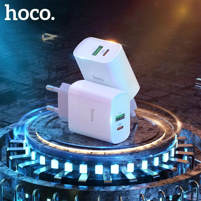 a white charger sitting on top of a circular table