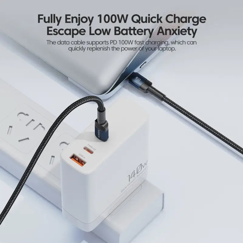 an image of a white power strip with a black cable