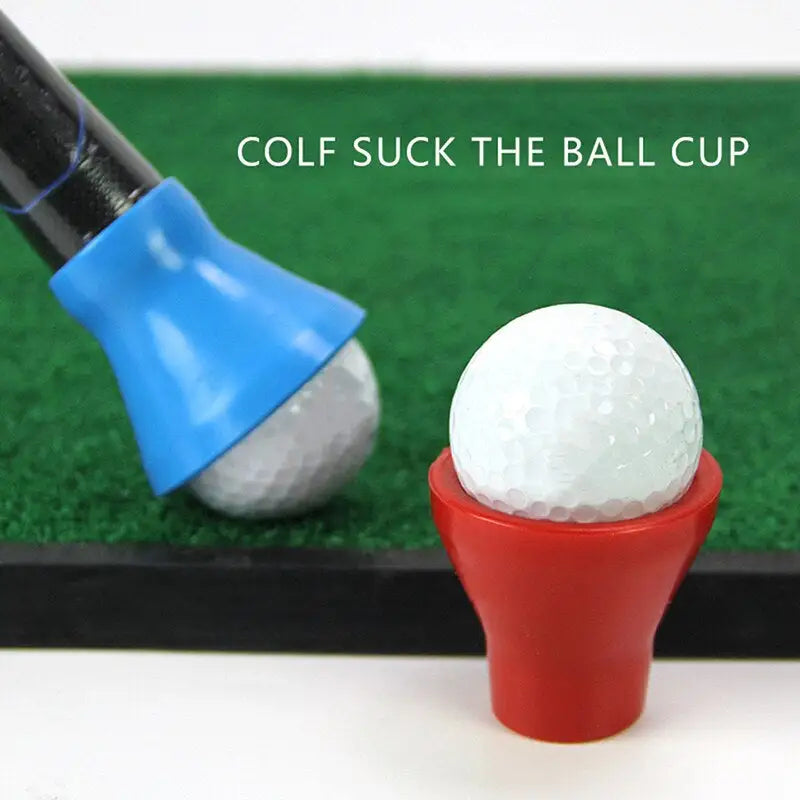 a golf ball and a golf tee on a green