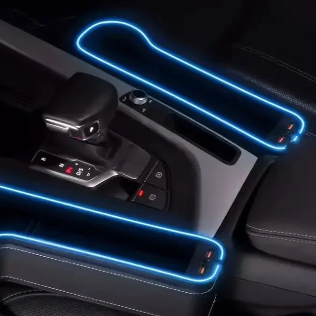 the interior of a car with a blue light