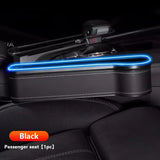 the interior of a car with a blue light on it