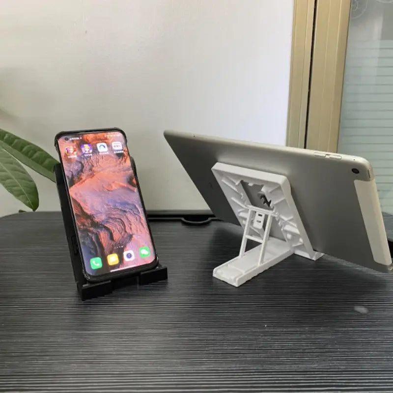 a phone and a tablet on a table