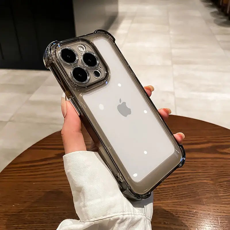 someone holding a clear case with a camera on it
