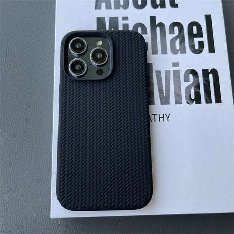 the case is made from carbon fibre and has a black carbon fiber