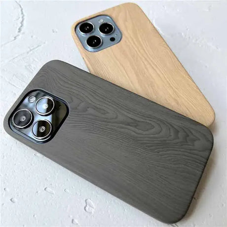 The iphone 11 case is made from wood and has a black finish