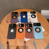 a table with several different colored cases on it