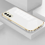 The iphone 11 is a gold case with a white back and gold sides