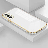 the iphone 11 is a gold case with a white back and gold sides