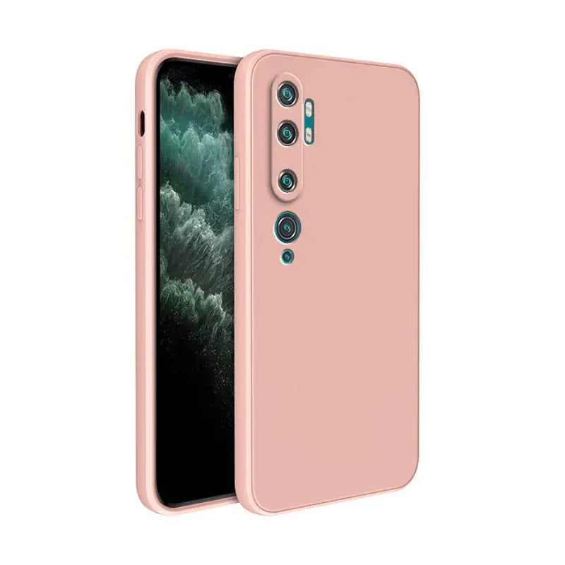 the back of an iphone 11 with a pink case
