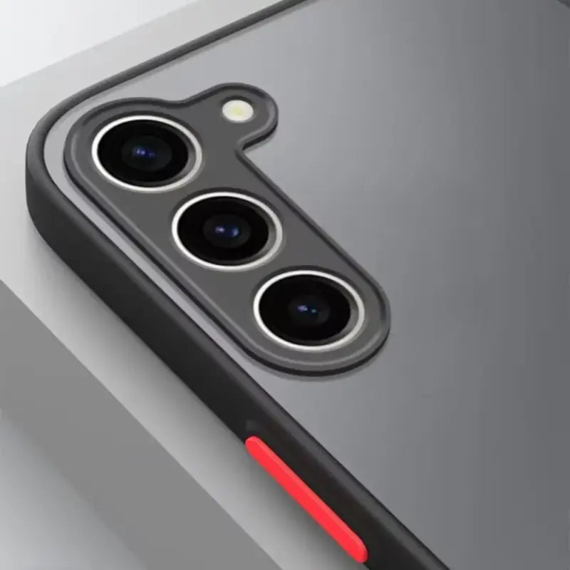 the back of the iphone 11 pro with a red light on it