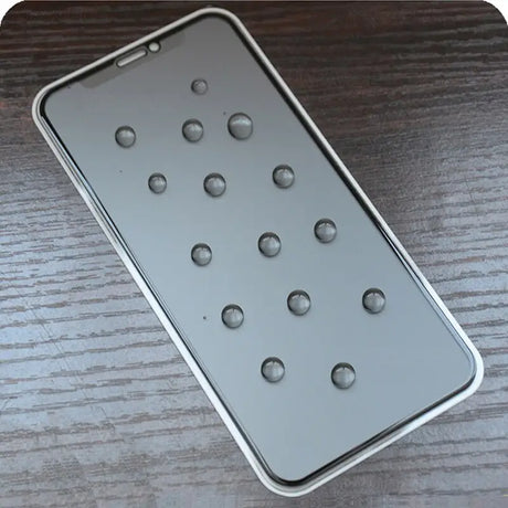 a cell phone with water droplets on it