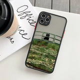 IPhone case featuring an artistic rendition of Monet’s water lilies with a black cat on a bridge.