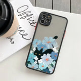 IPhone case featuring a black cat among blue and white flowers.