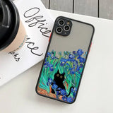 IPhone case featuring a black cat among blue irises in a garden-like setting.