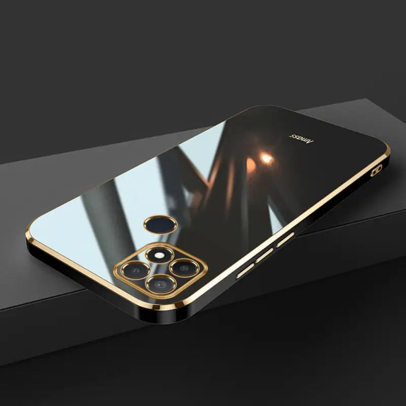 the iphone 6s is a gold - plated phone with a curved back and a curved back