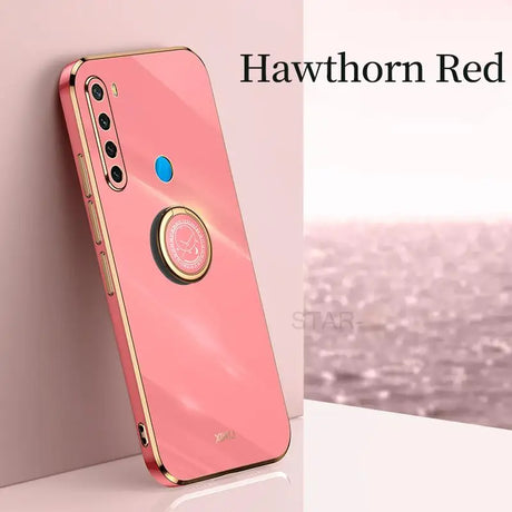 the iphone case is pink with a circular design