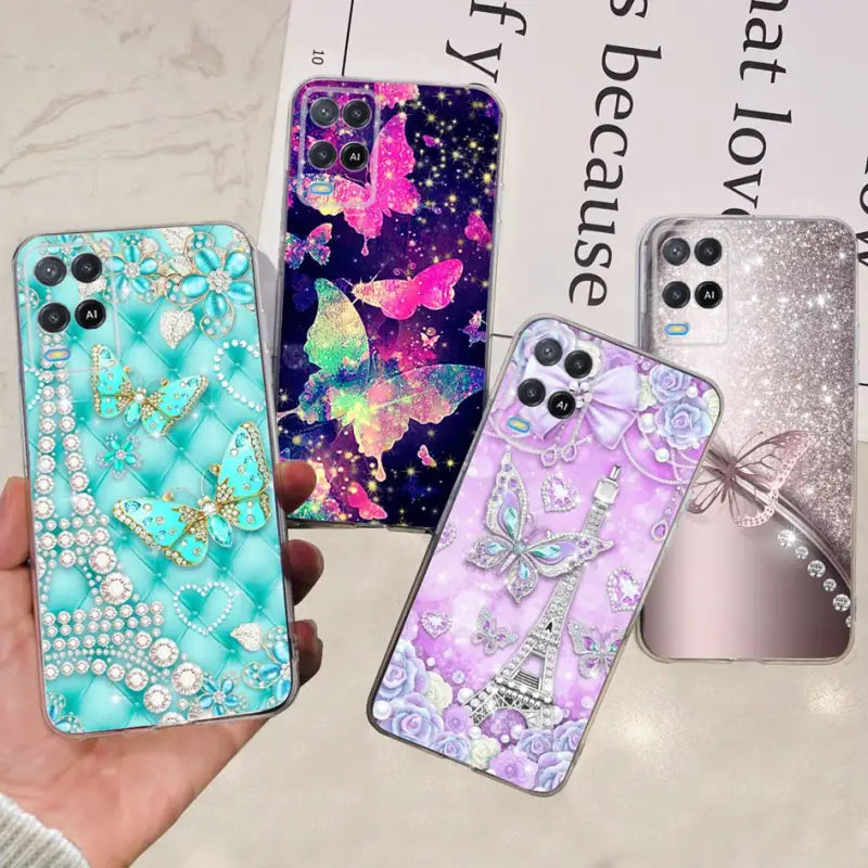 a hand holding a phone case with a variety of different designs