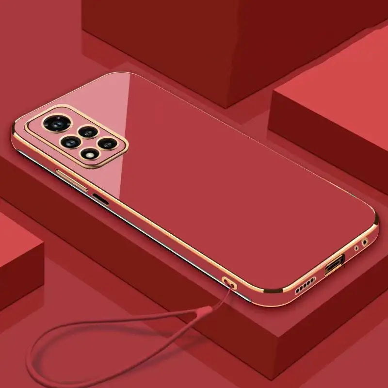 a red iphone case with a gold frame