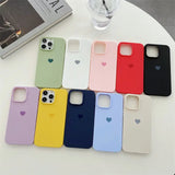 a set of four iphone cases on a table