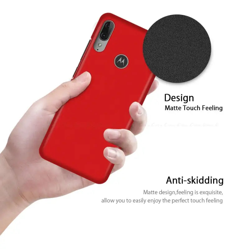 the red iphone case is held up to show the design