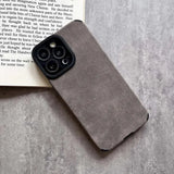 The iphone case is made from a soft grey sued material