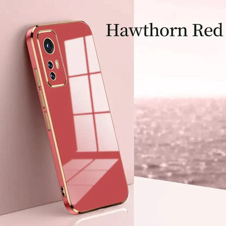 a red iphone case with a white background