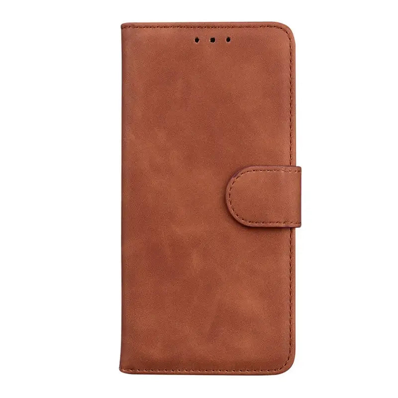 the back of a brown leather iphone case