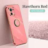 The iphone case is pink with gold trim