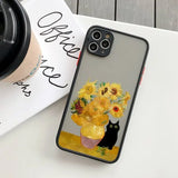 IPhone with a case featuring Van Gogh’s Sunflowers painting and a black cat.