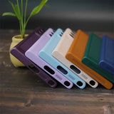 the iphone case is made from plastic and has a colorful design