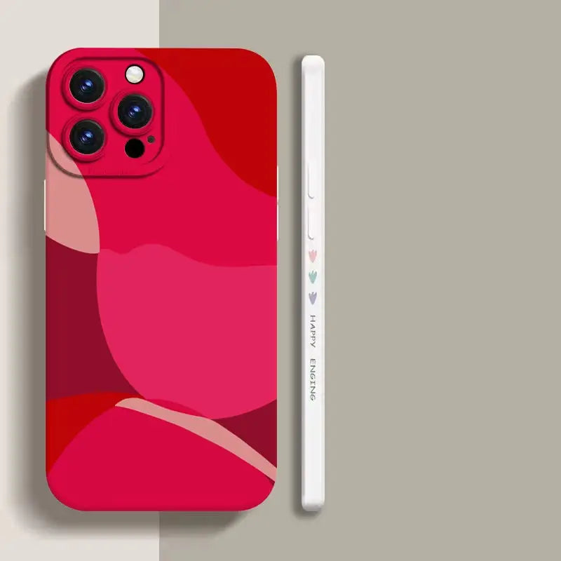 a red iphone case with a white phone in the background