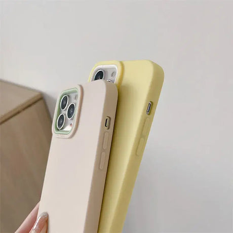 The iphone case is shown in yellow and white