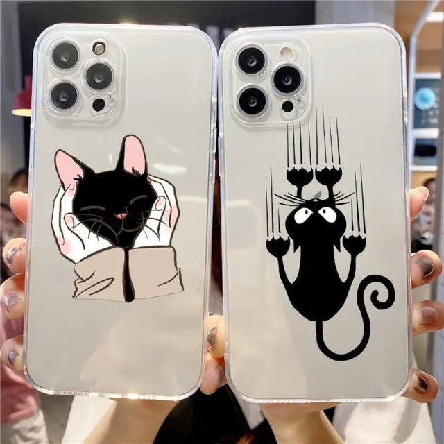 two cats are holding up their hands while they are wearing their own phone cases