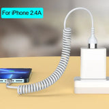 an iphone charging station with a phone and a charger